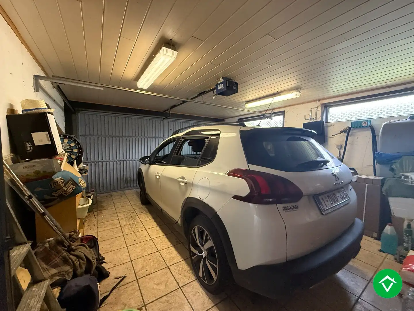 Rustig gelegen gelijkvloerse halfopen woning met 2 slpk's + dubbele garage foto 20