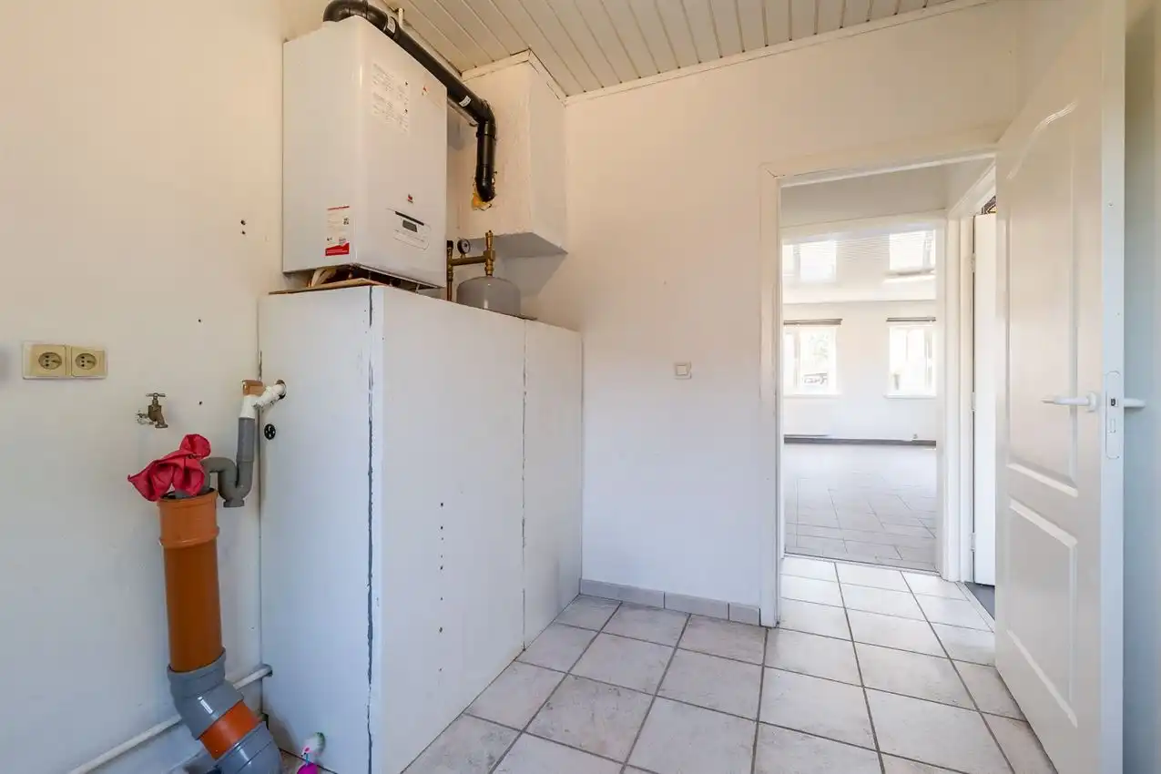 Verzorgde woning met 2 slpk., tuin en garage foto 25