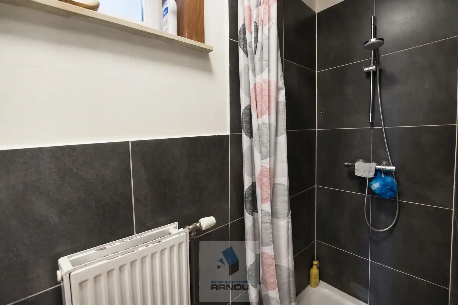Gezellig gelijkvloers appartement met 1 slaapkamer, stadstuintje en privatieve autostaanplaats foto 18