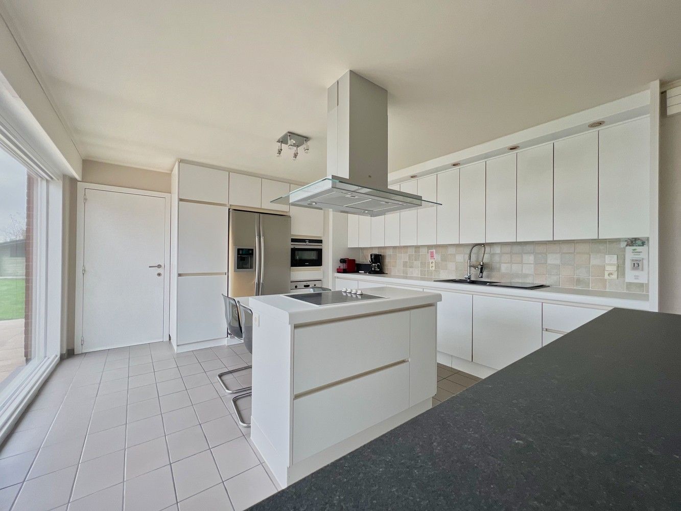 Heel ruime gezinswoning (350m²)+prachtige tuin (2000m²)! foto 7