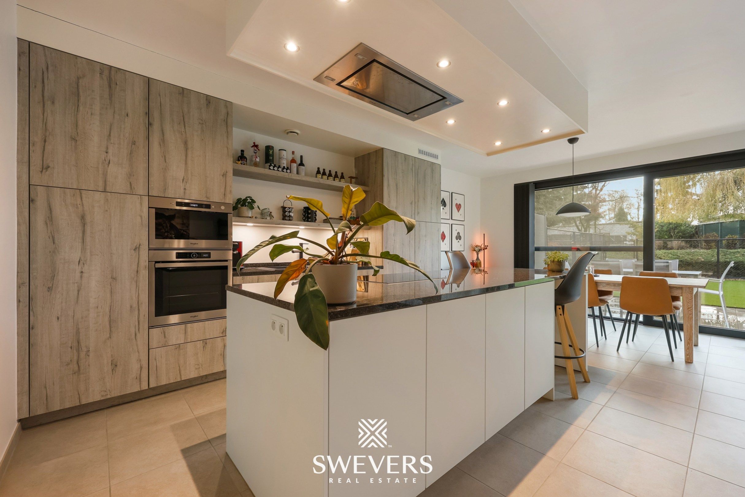 Gelijkvloers appartement met privétuin en dubbele garage foto 8