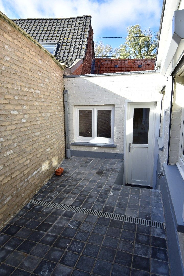 Halfopen bebouwing met 2 slaapkamers, garage en gezellig zonneterras te koop in Bellegem foto 13