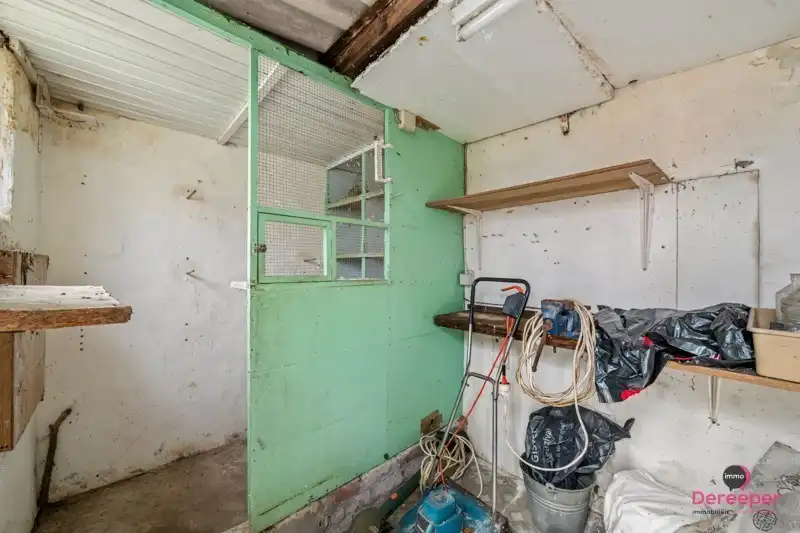 Te renoveren rijwoning op centrale ligging met leuke zuidgerichte tuin foto 19