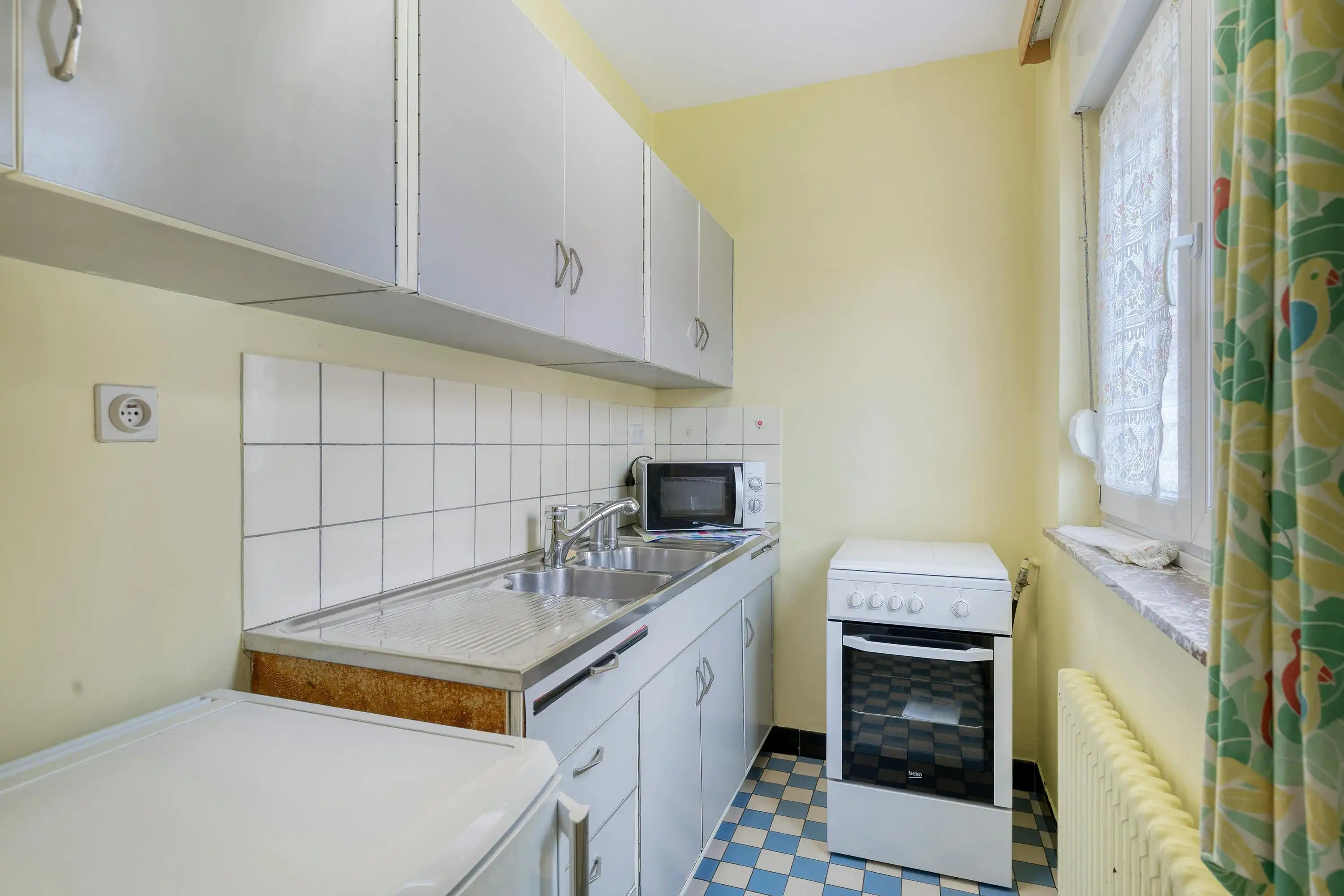 Charmante bel-étagewoning met mooie tuin op een toplocatie in Groot-Bijgaarden foto 11