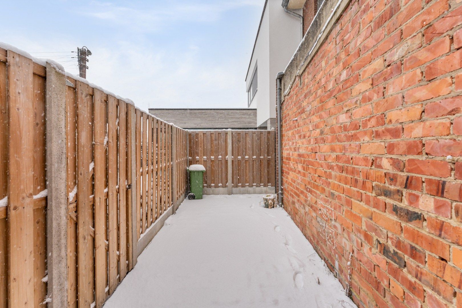 Centraal gelegen gebouw bestaande uit een handelspand op het gelijkvloers en een bovenliggend duplex-appartement! foto 27