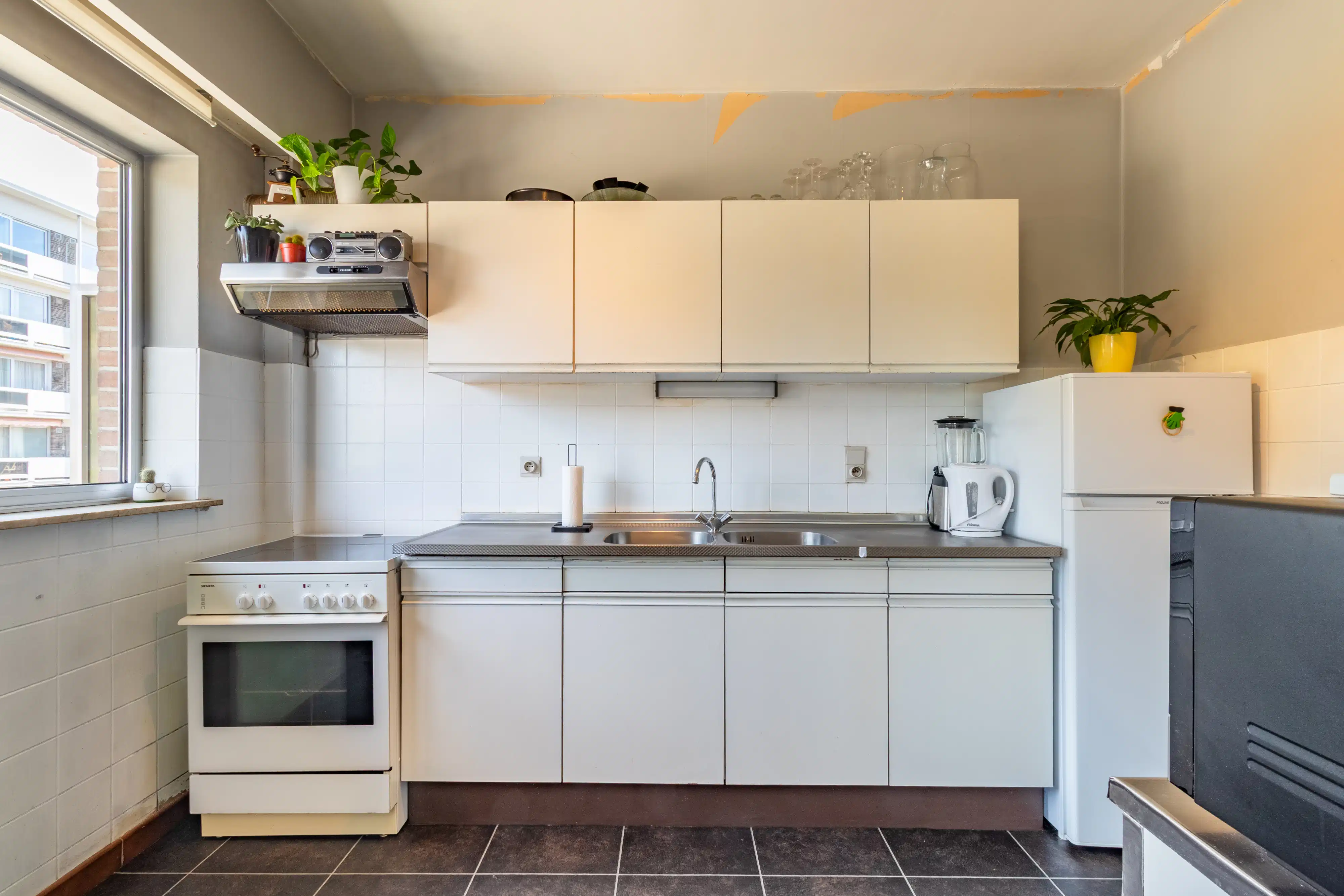 Praktisch appartement met garagebox en twee terrassen foto 5