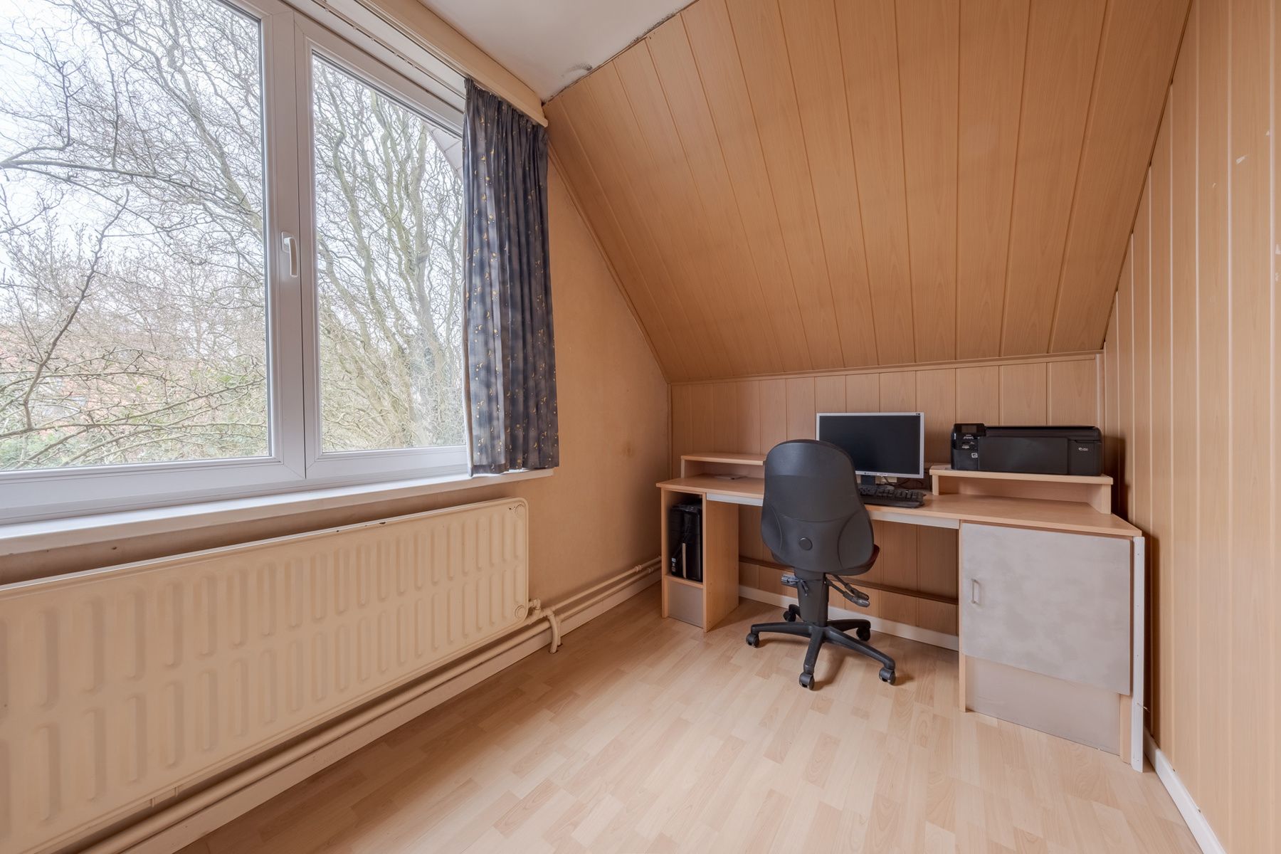 Goed gelegen woning met potentieel foto 8