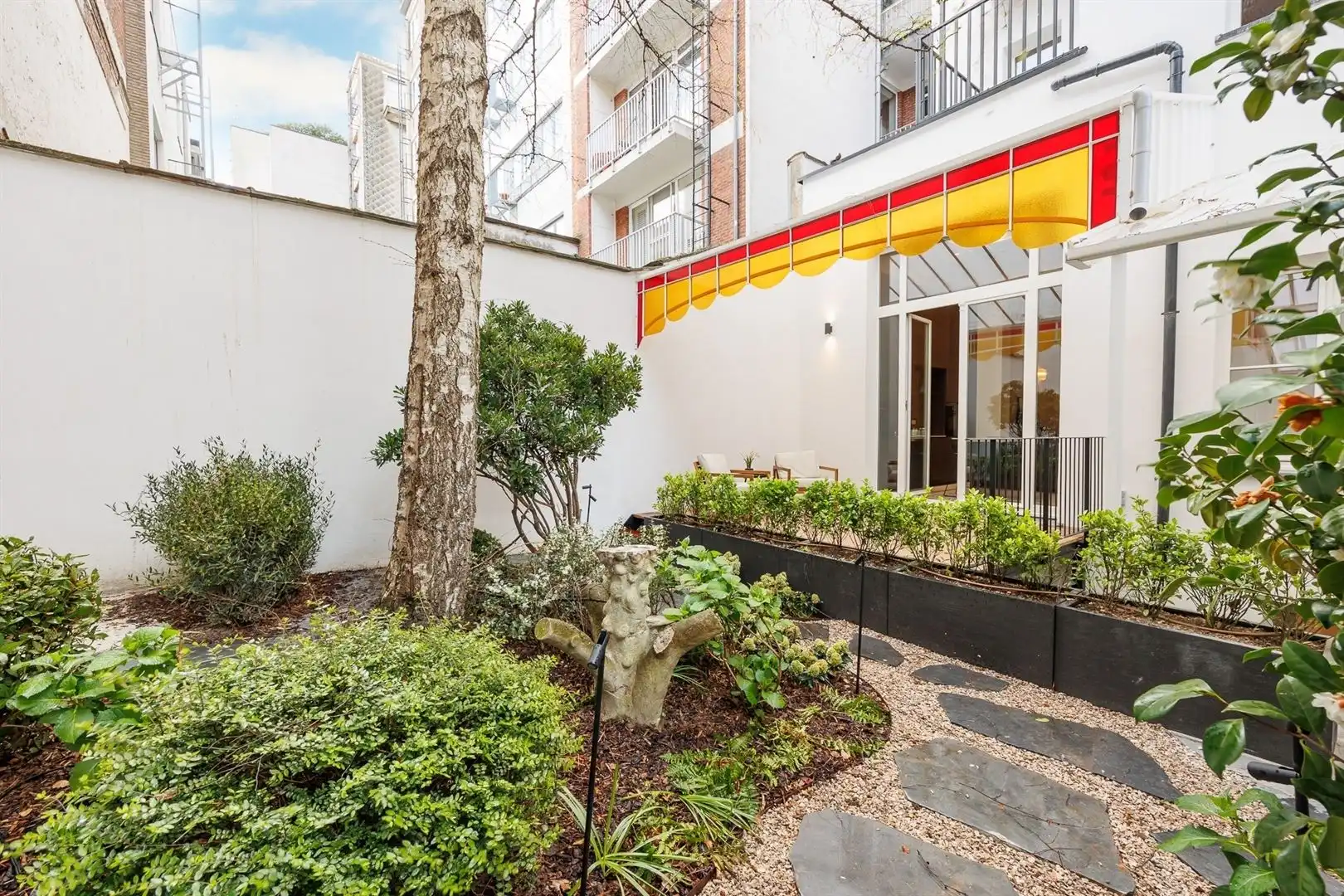 Prachtig afgewerkt appartement met tuin foto 22
