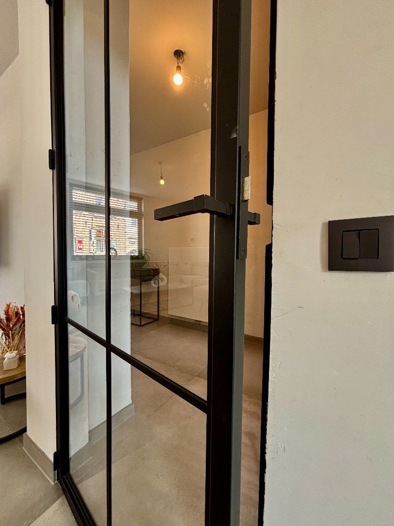 Gerenoveerde rijwoning in centrum Vlamertinge foto 20