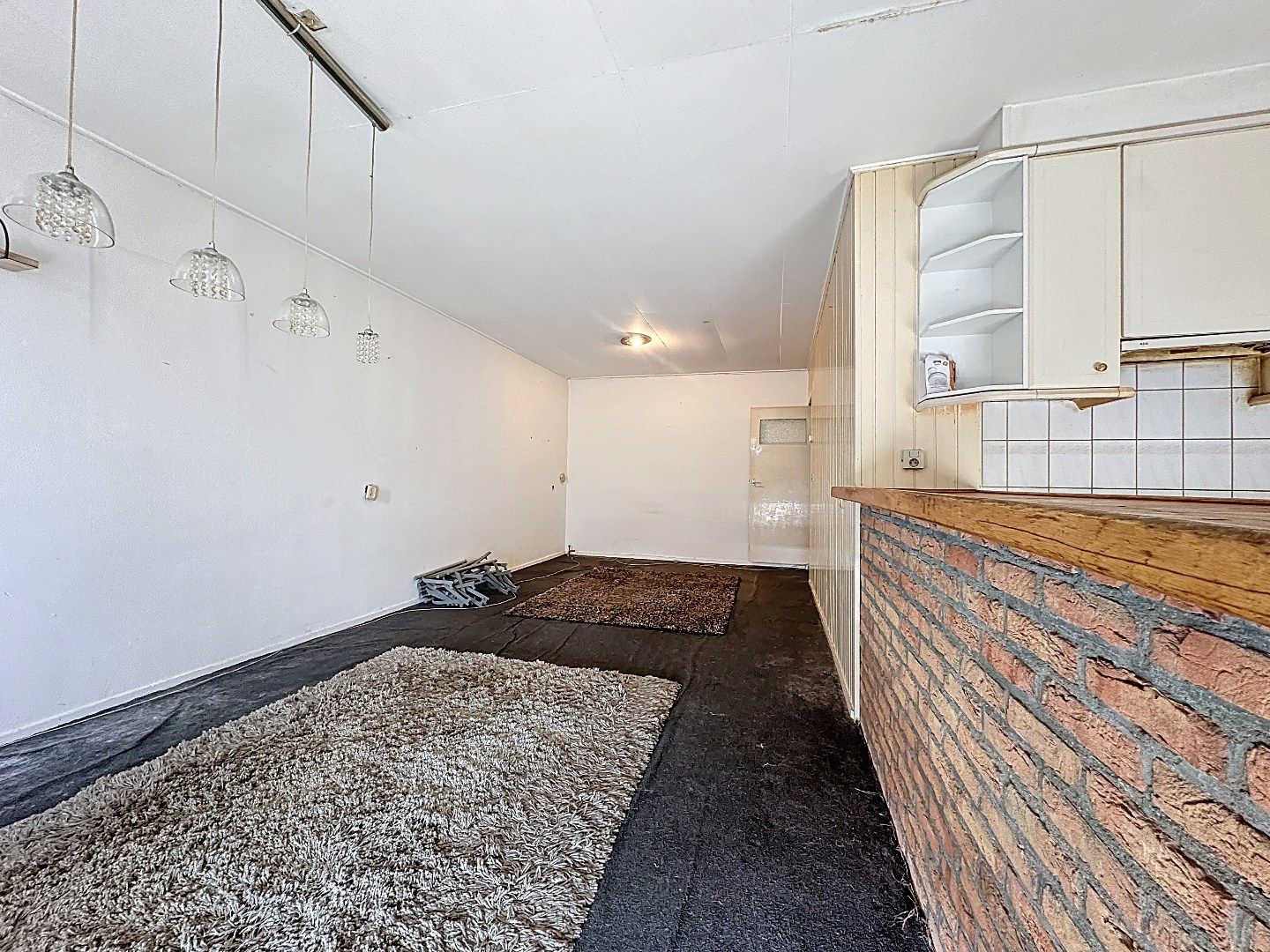 Te huur: Winkelpand met bovenwoning  foto 14