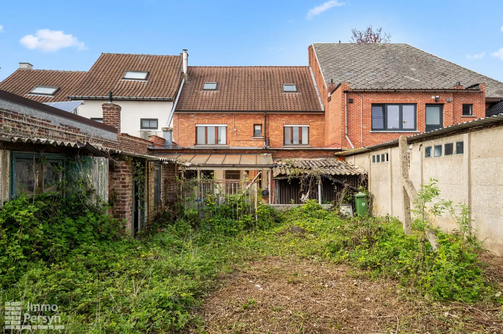 Te renoveren woning met zuidtuin en achteringang met garages foto 21
