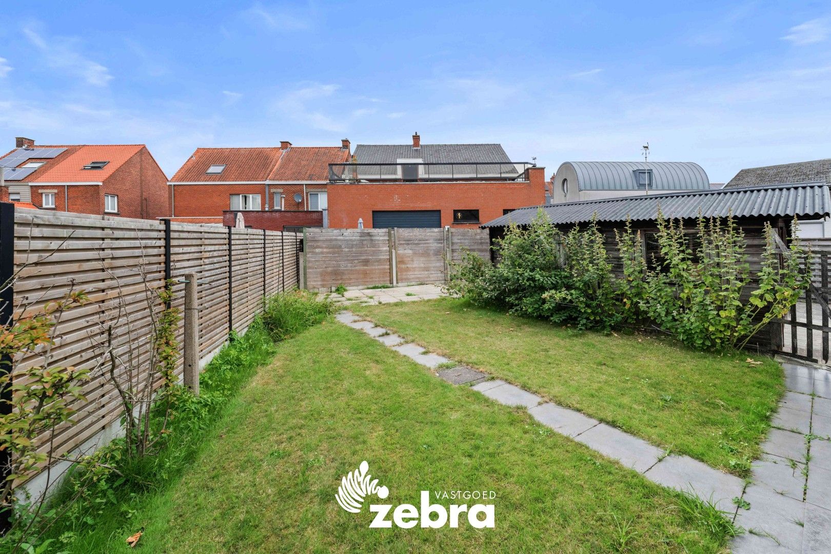 Op te frissen alleenstaande woning met vier of meer slaapkamers & garage te Roeselare! foto 35