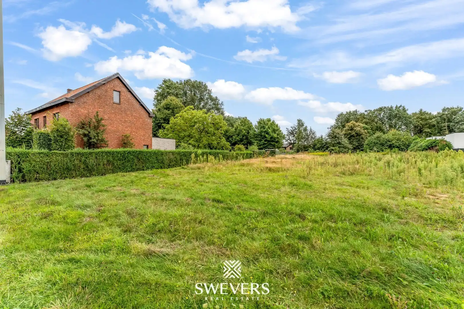 Knappe bouwgrond voor open bebouwing op 12a 74ca in hartje Helchteren foto 12