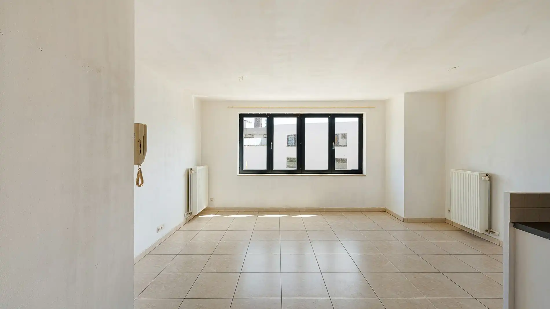Verzorgd appartement op een centrale locatie te Heist. Garage mogelijk foto 2
