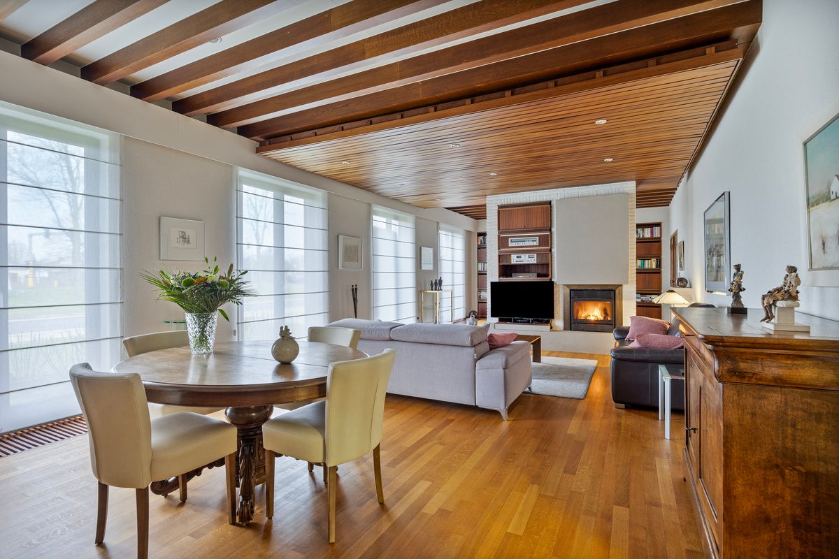 Ruime gelijkvloerse woning met bedrijfshal foto 6