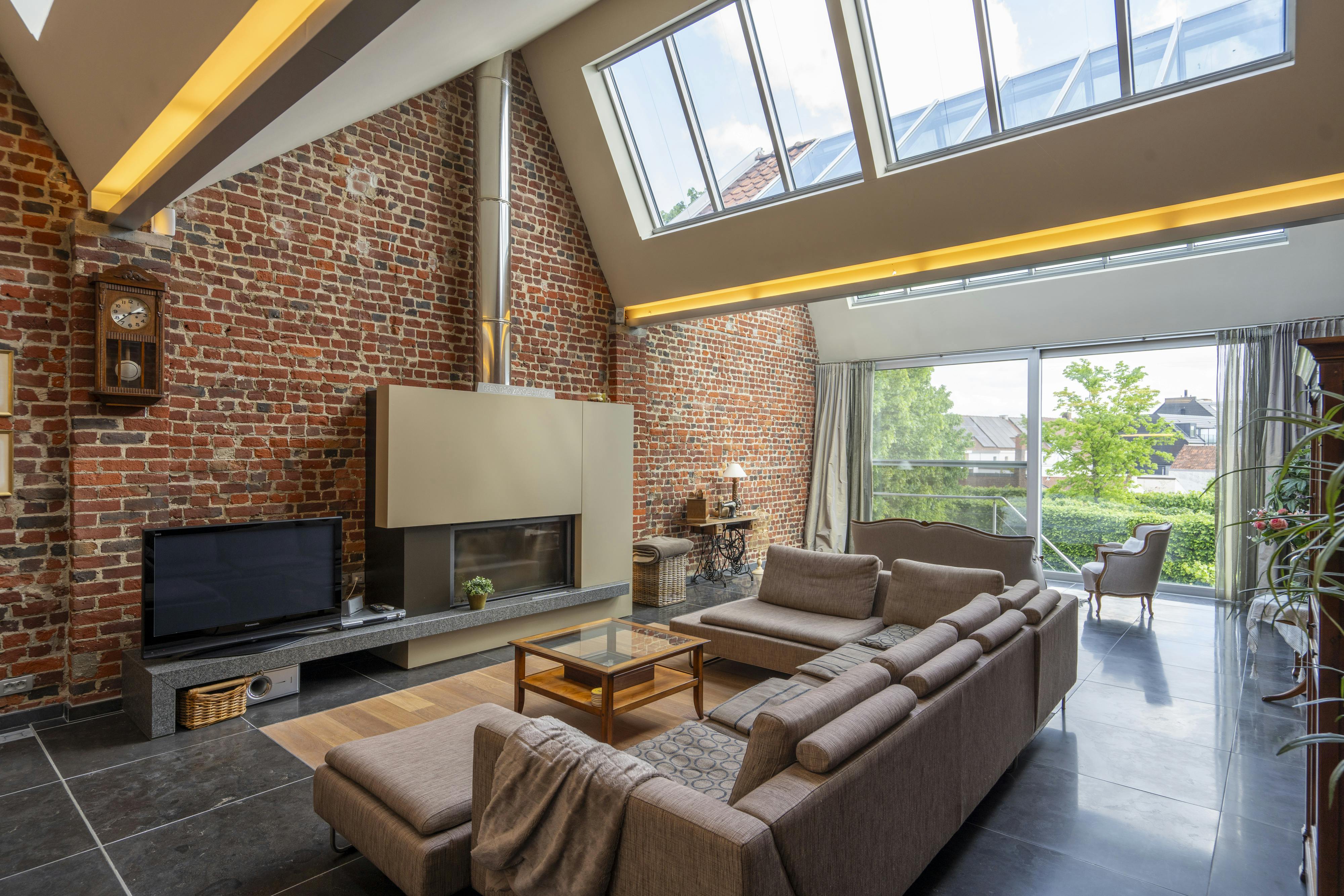 Unieke loftwoning met ruime garage en prachtige tuin foto 5