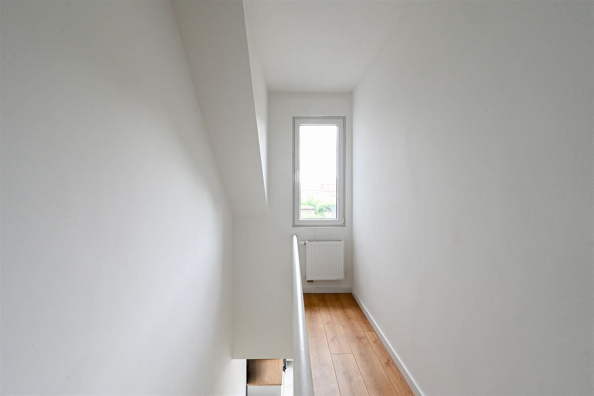 Lichte woning met diepe tuin foto 15