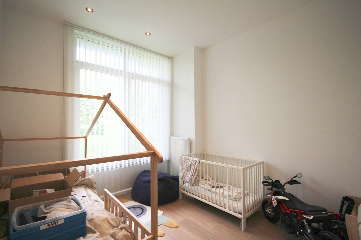 Gelijkvloers appartement met staanplaats en kelder! foto 4