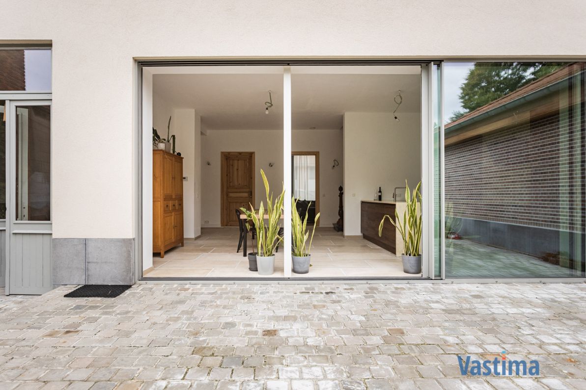 Exclusief herenhuis met idyllische tuin en dubbele garage in hartje Aalst foto 30