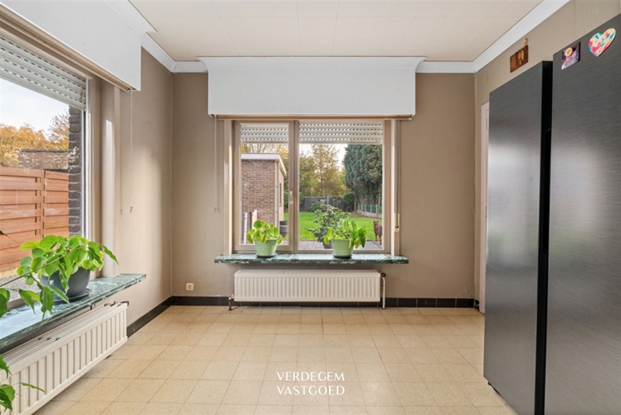 Woning met 4 slaapkamers, tuin en garage op topligging foto 8