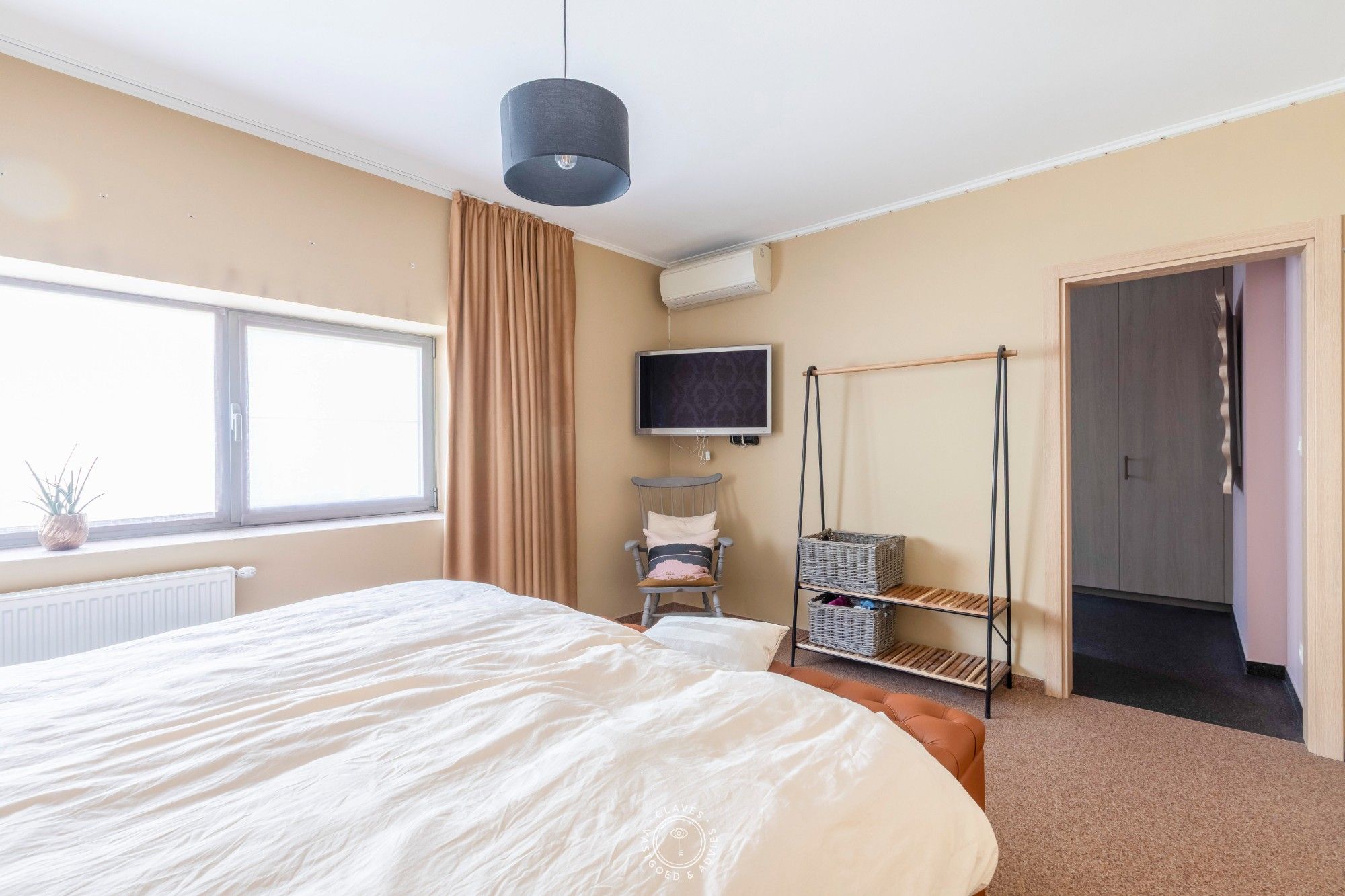 Instapklare woning en ruime tuin in het hart van Vrasene foto 16