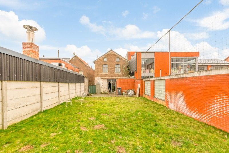 Woonappartement met handelsruimte in het centrum van Wommersom foto 33