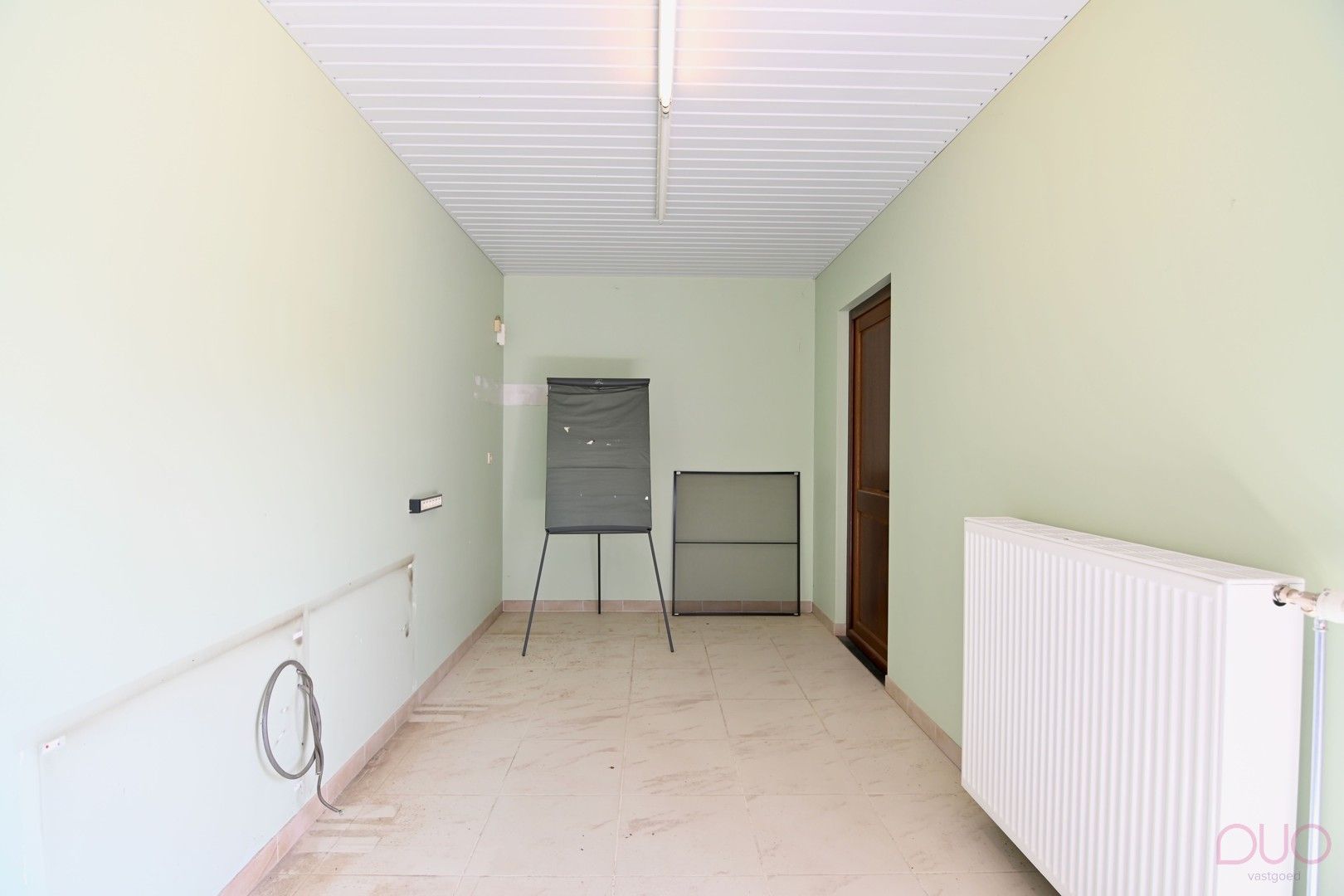 Gelijkvloerse  woning met 1 slaapkamer (optioneel 2) met achterliggend 2 garages nabij het centrum van Tongeren foto 13
