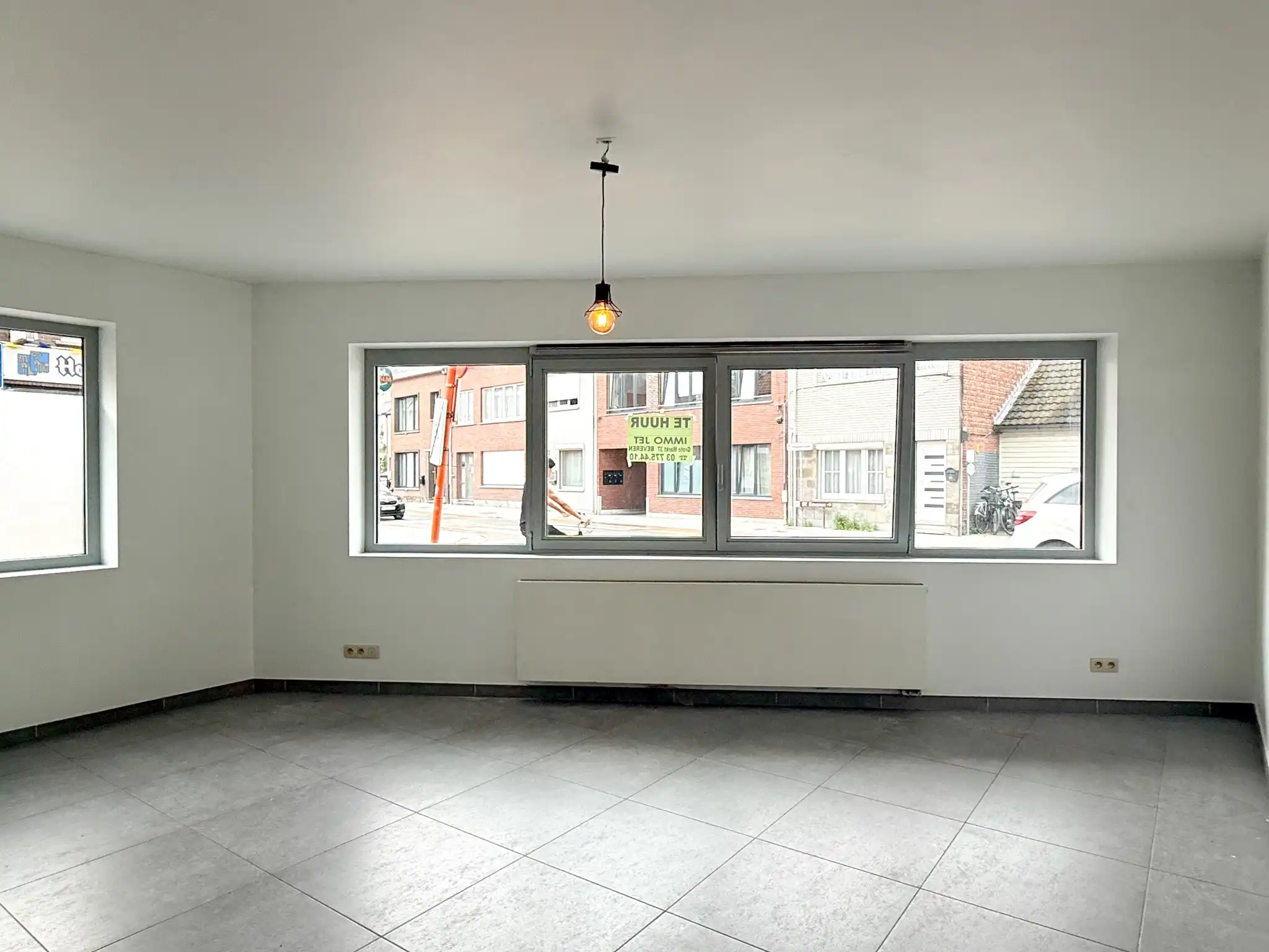 Gelijkvloers appartement met 2 slaapkamers en autostaanplaats foto 4