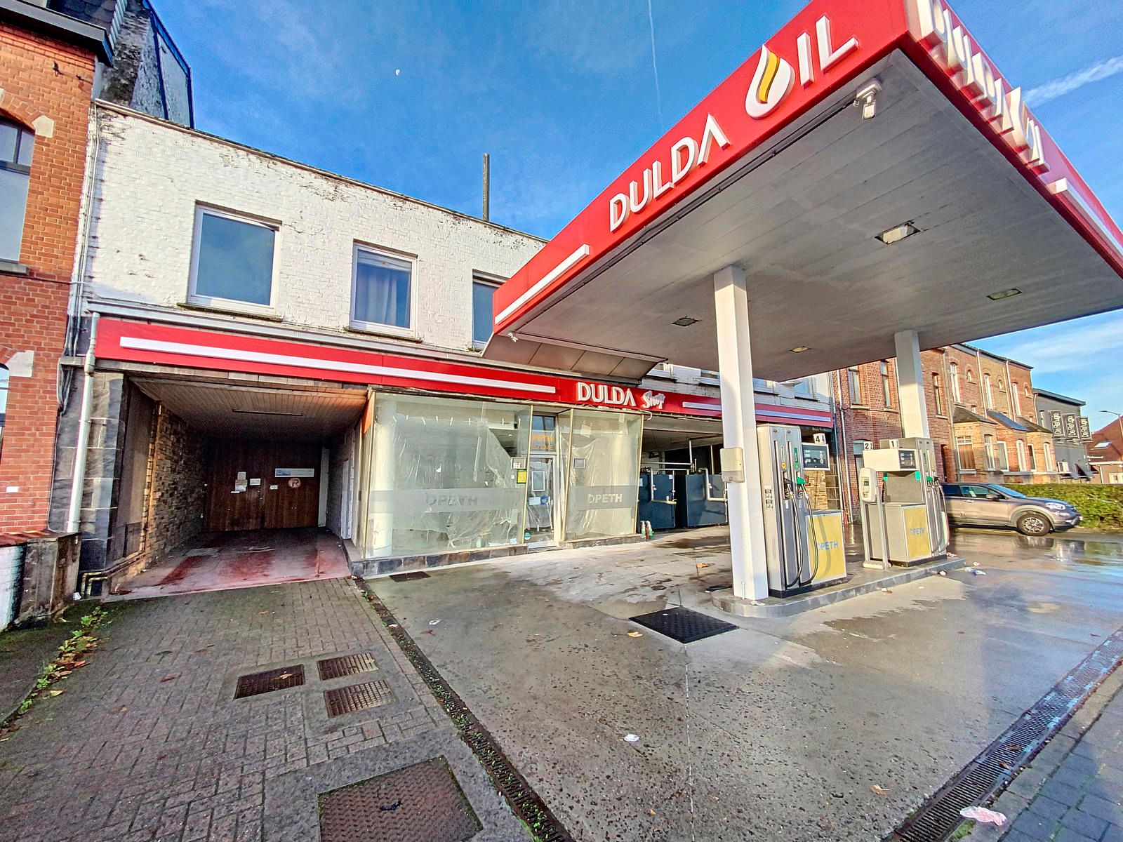 Tankstation met 2 appt en 10+ parkeerplaatsen.  foto 39