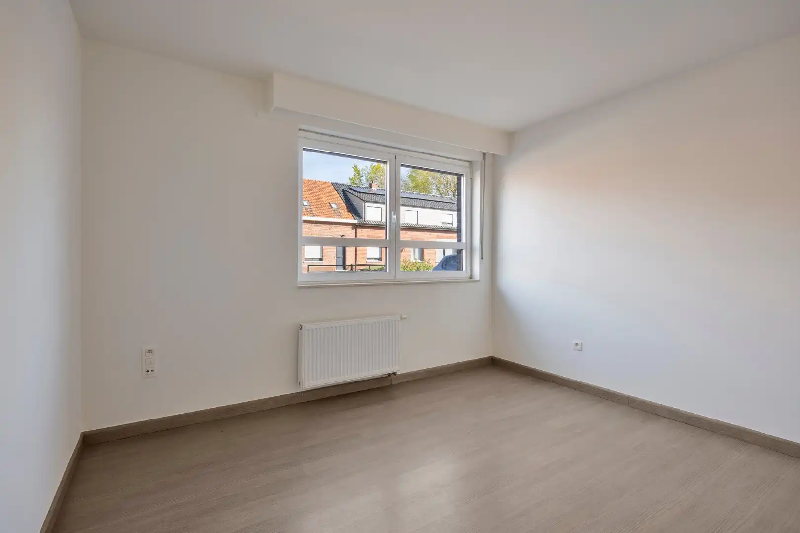Ruim gelijkvloers 2 slaapkamer appartement met garage op centrale ligging te Dessel foto 9