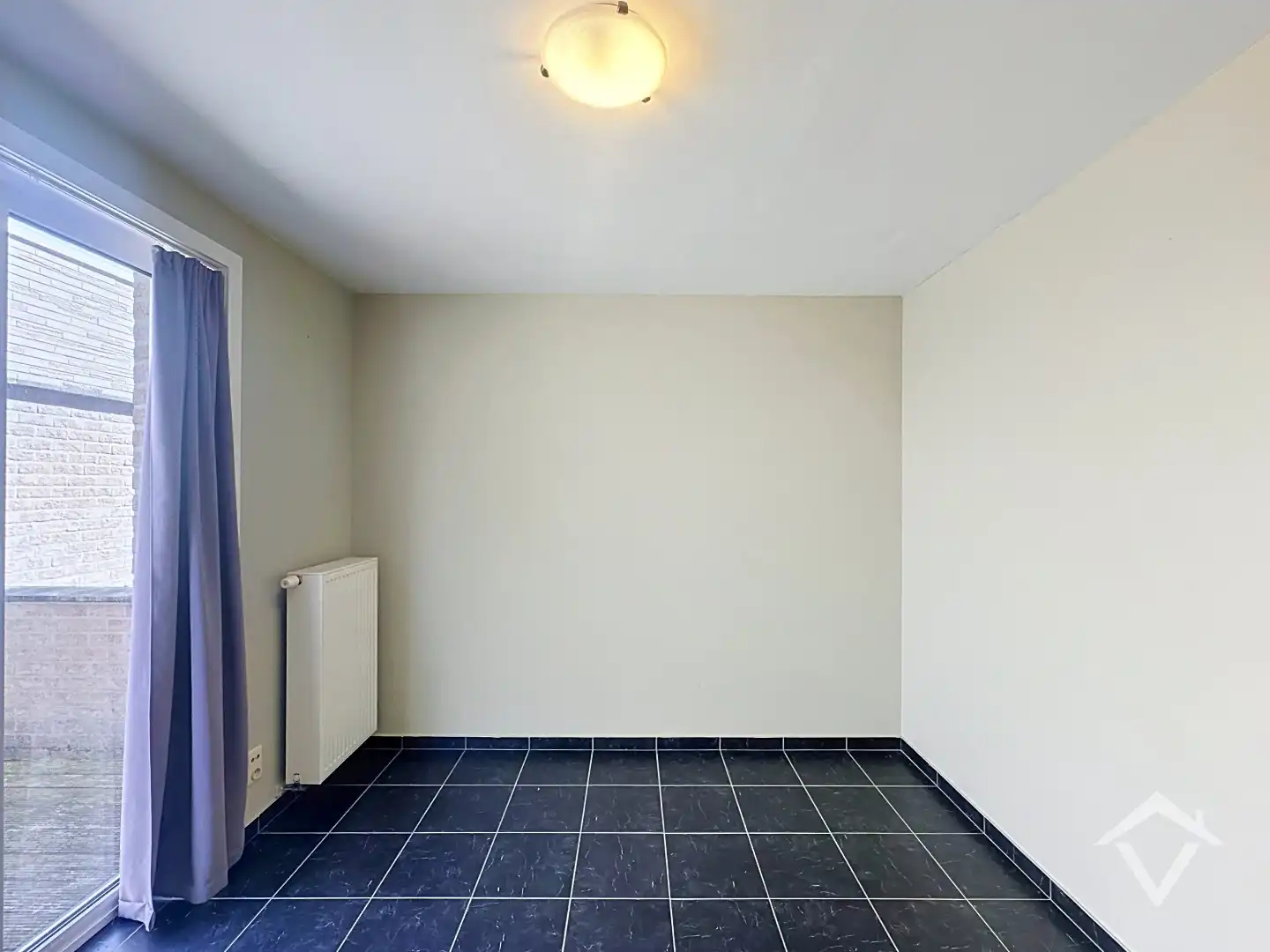 Instapklaar gelijkvloers appartement met twee slaapkamers, terras en ondergrondse parkeerplaats.  foto 16