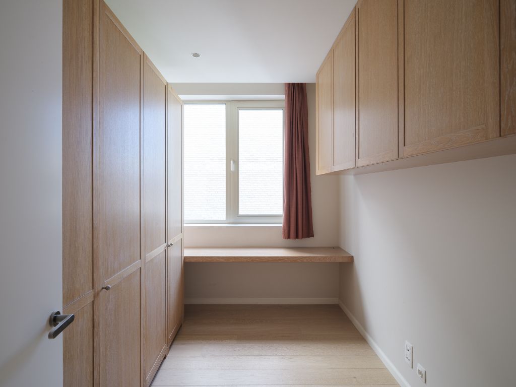 Luxueus tweeslaapkamerappartement met ruim terras en centrale ligging aan de Kouter. foto 11