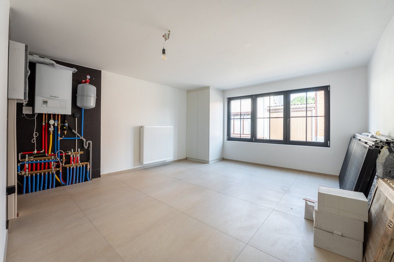 Volledig gerenoveerde gelijkvloerse woning met leuke tuin foto 18