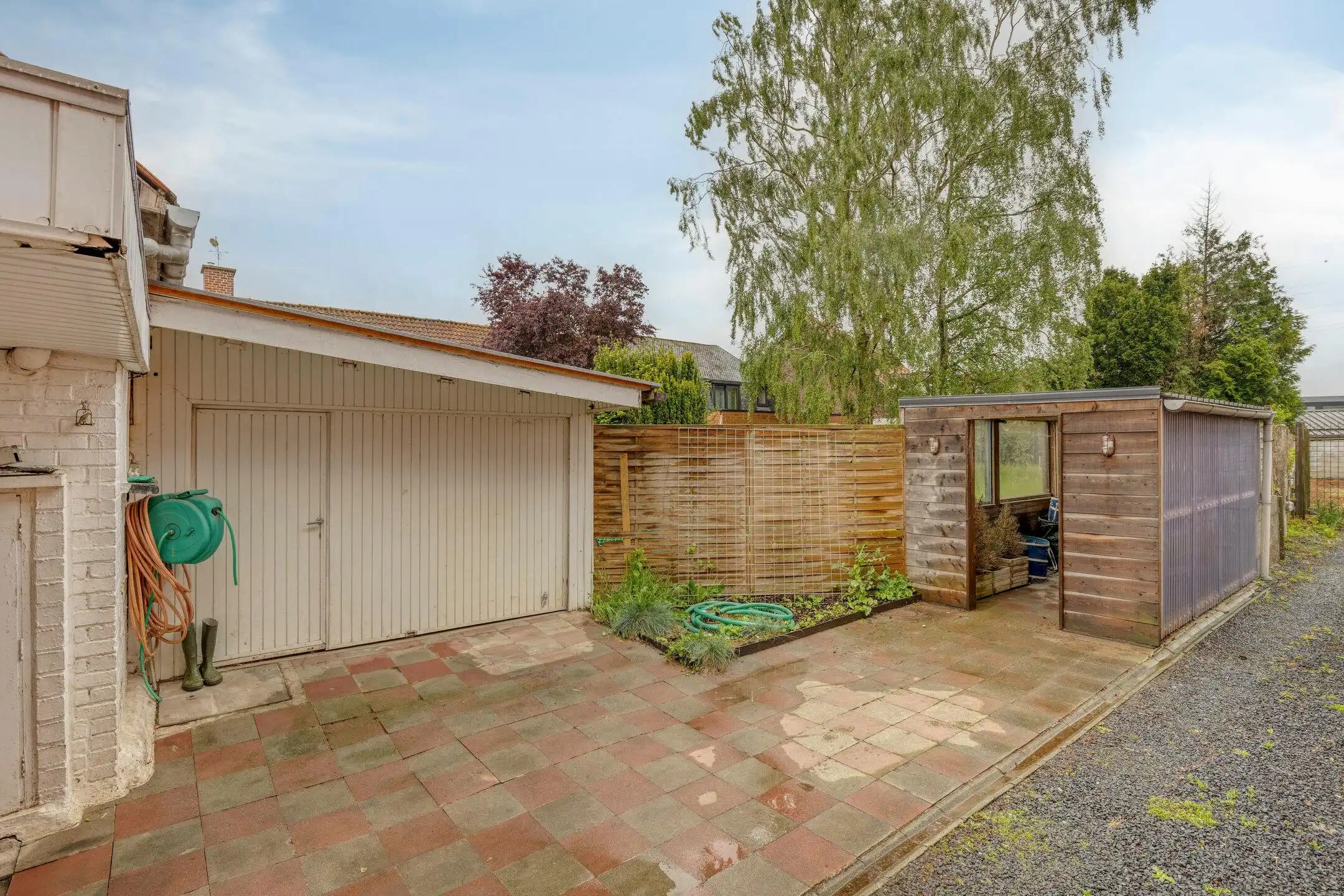 Te renoveren woning met grote tuin en bijgebouw te Heule foto 8
