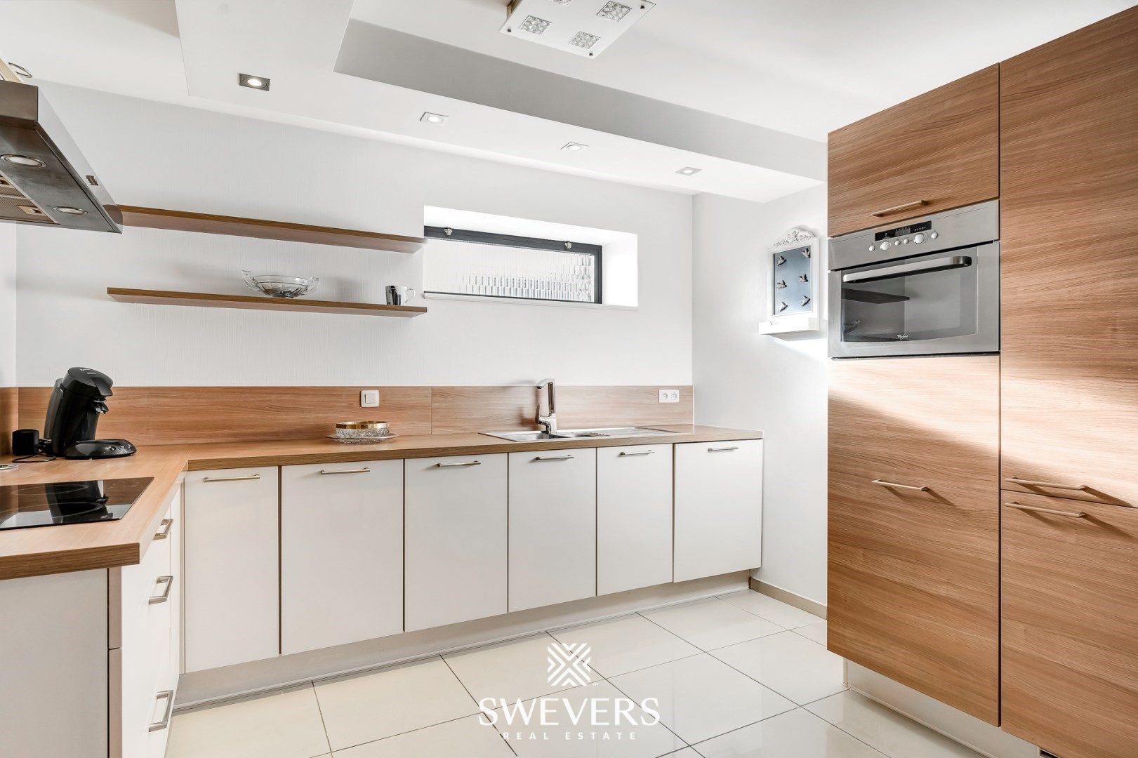 Instapklare woning met handelszaak en appartement in Geetbets foto 17