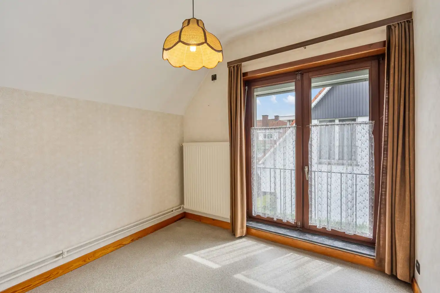 Goed gelegen woning met 4 slaapkamers, een garage en een diepe tuin in een verkeersluwe straat te Kessel-Lo! foto 18