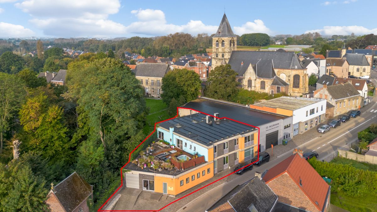 State of the art loft met groot terras, garage en polyvalente ruimtes – Een woonbeleving uniek in zijn soort foto {{pictureIndex}}