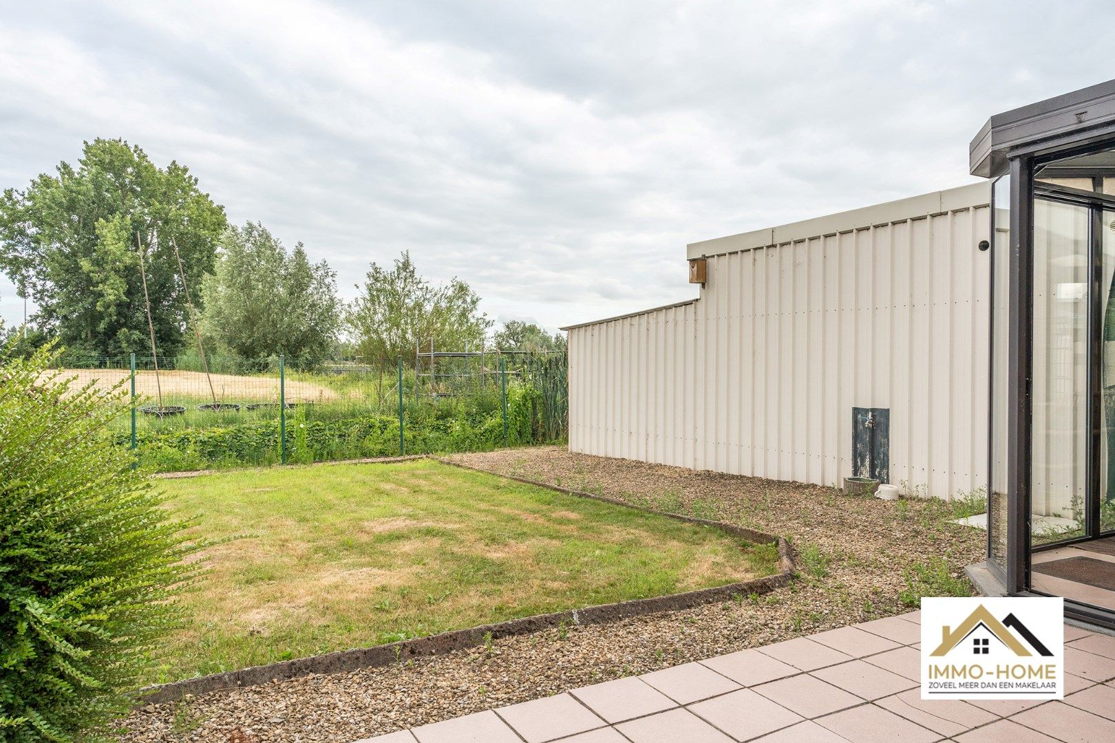 Op te frissen woning met ruime opslagplaats te Beervelde foto 7