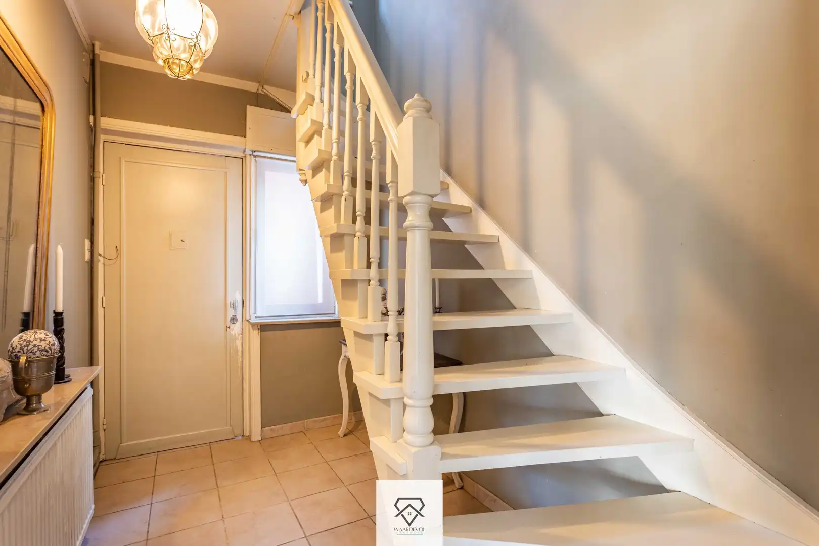 Gezinswoning met tuin en veel potentieel in het gegeerde Oostakker foto 5