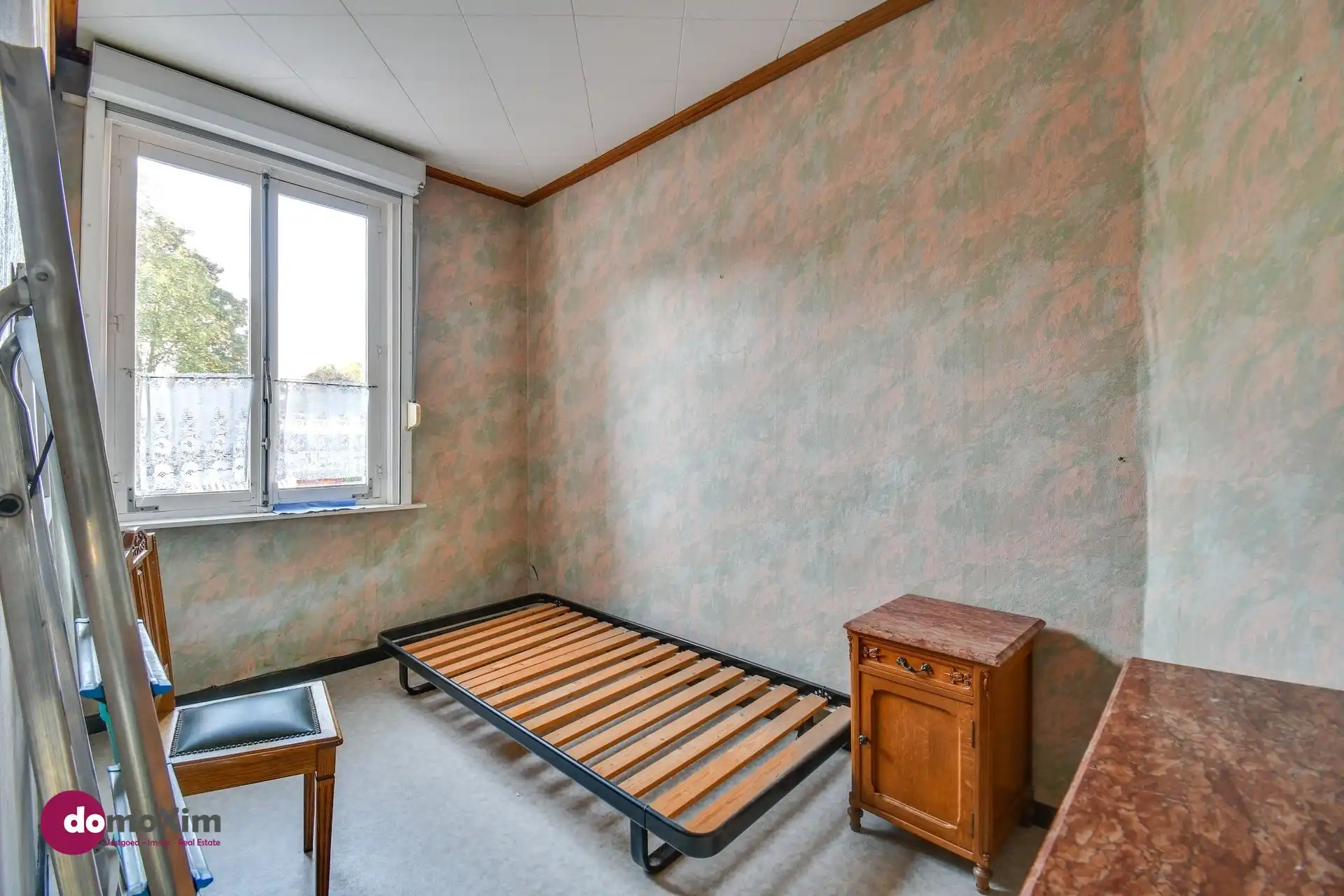 Te renoveren stadswoning met zuid-gerichte tuin en garage foto 12