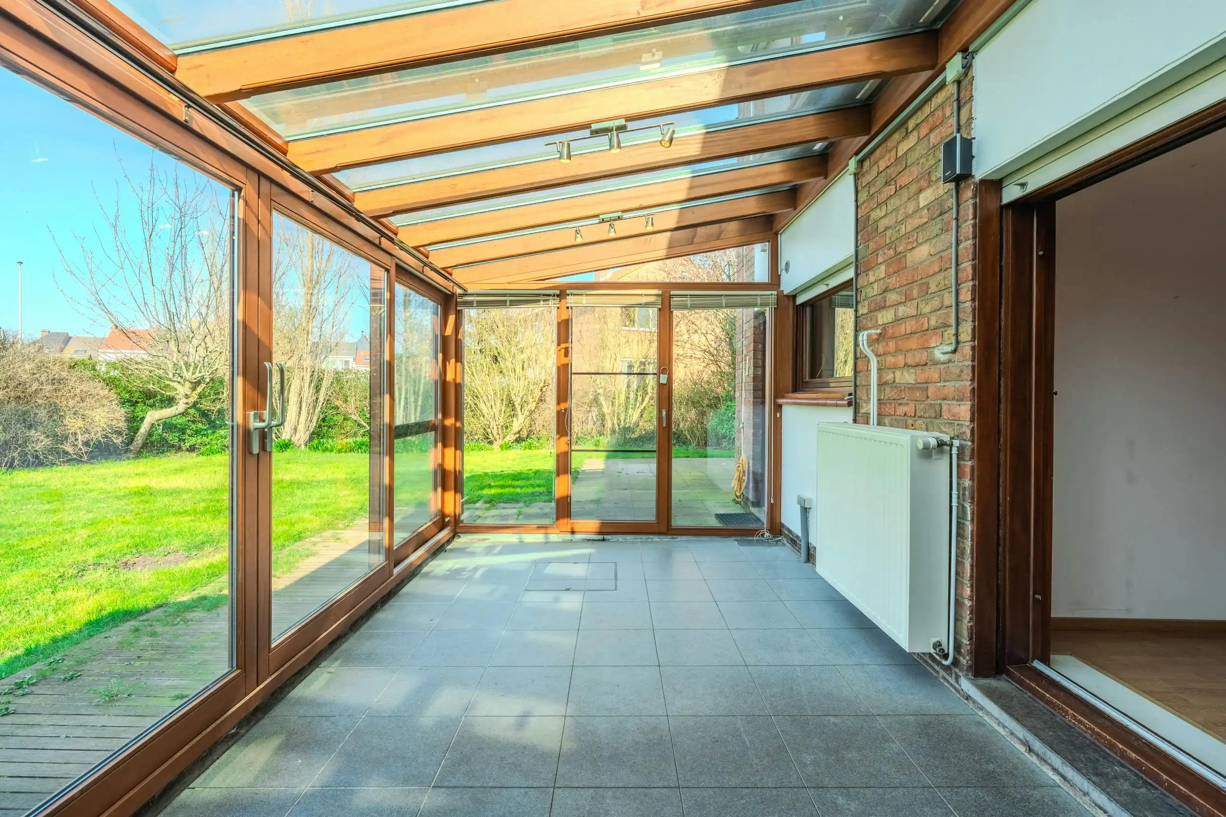 Halfopen woning met 4 slpks en zonnige tuin te Mariakerke foto 4