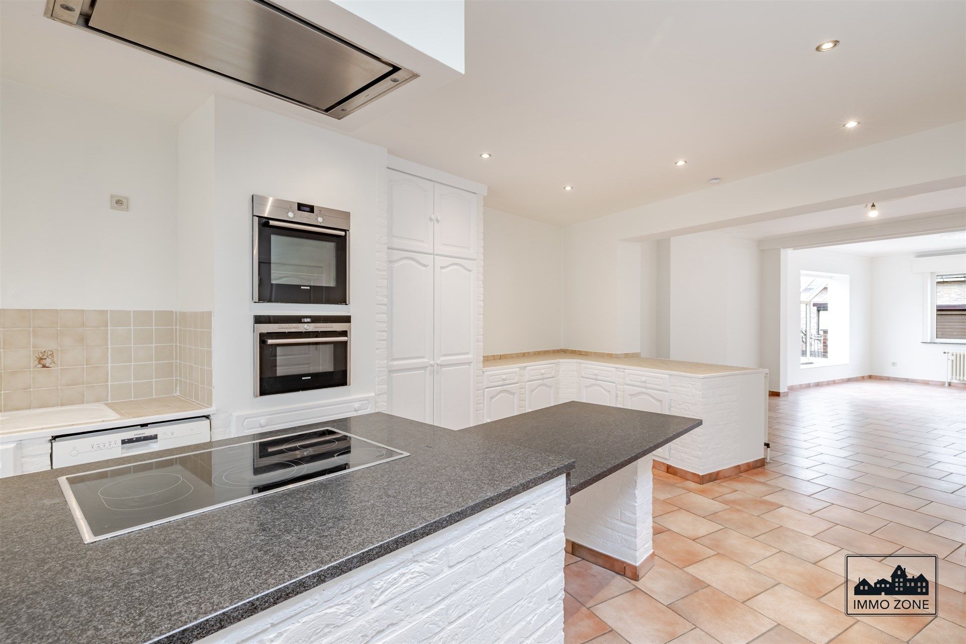 Lichtrijke halfopen woning te Nieuwerkerken! foto 5