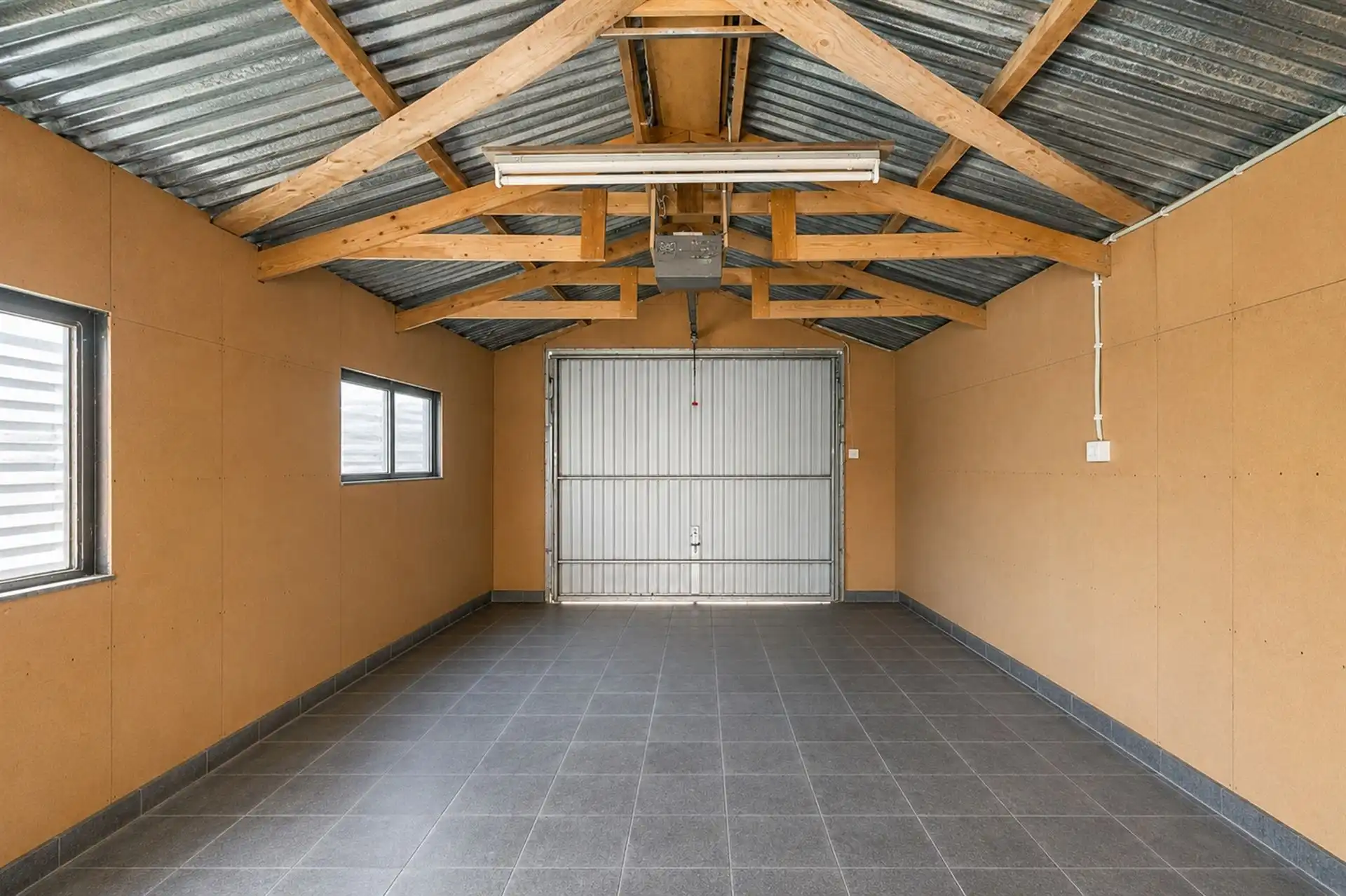 Instapklare woning met zonnige tuin, garage & tweede uitweg foto 15