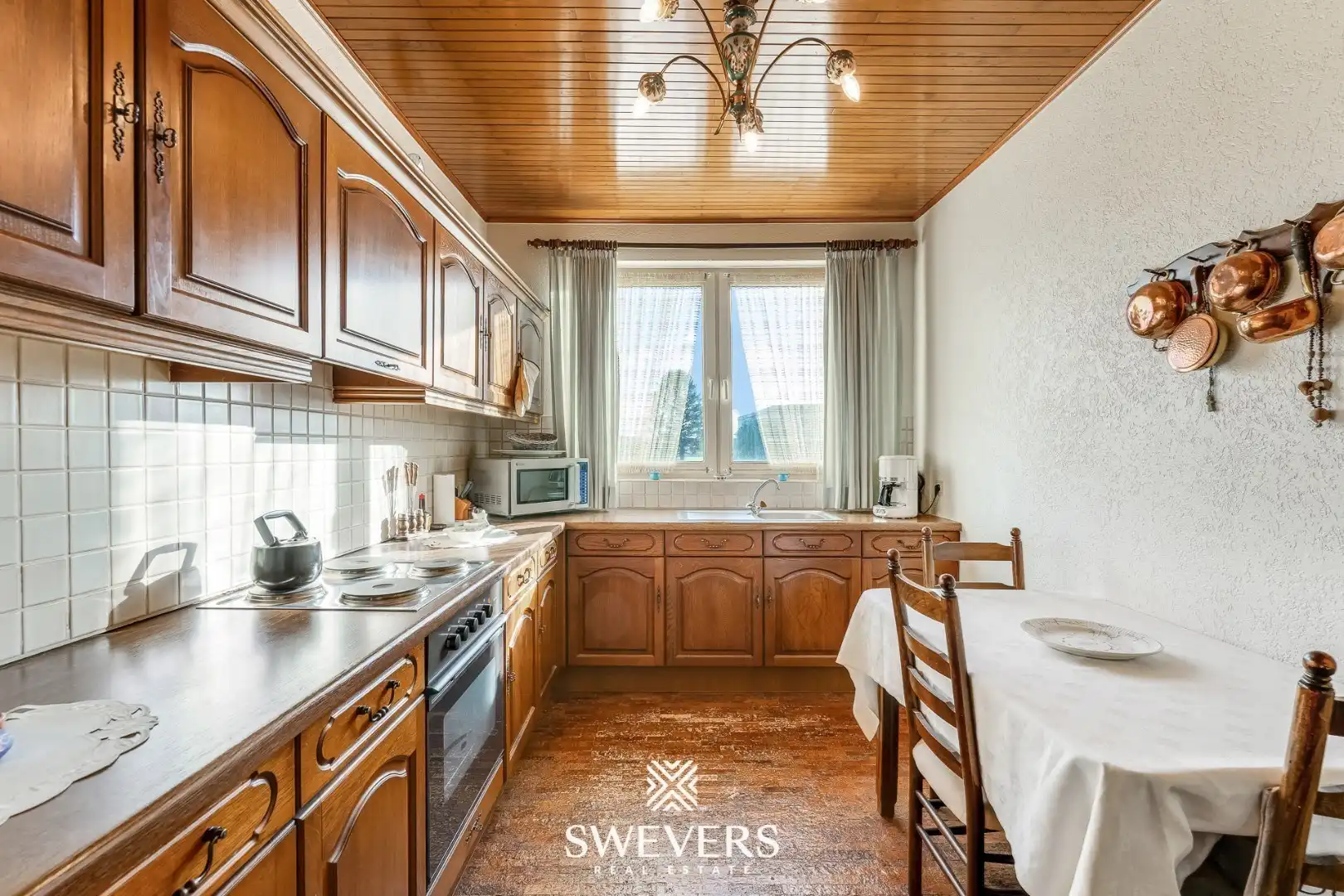 Duplex-appartement met handelsruimte, terras en tuin op toplocatie Riemst foto 9