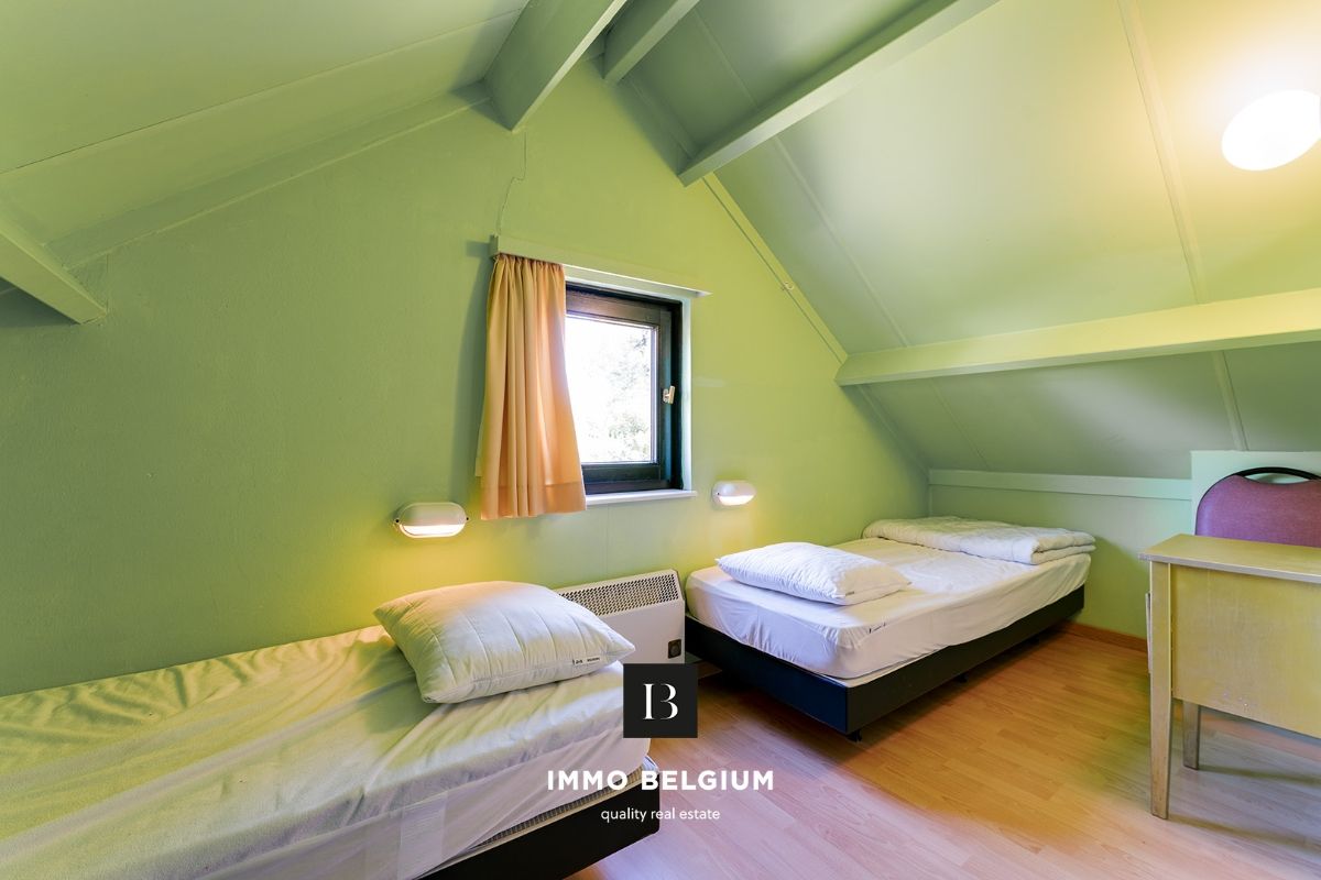 Goed onderhouden vakantiewoning nabij het bos foto 13
