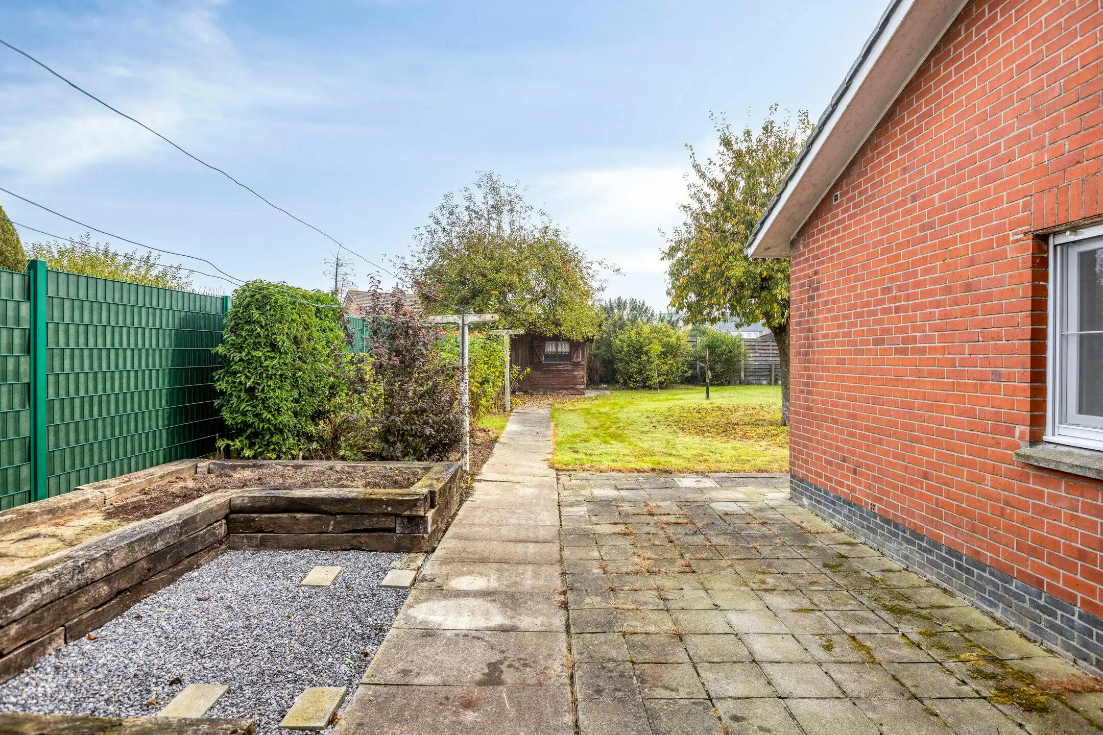 Gelijkvloers huis te koop met 3 slaapkamers, garage en tuin foto 19