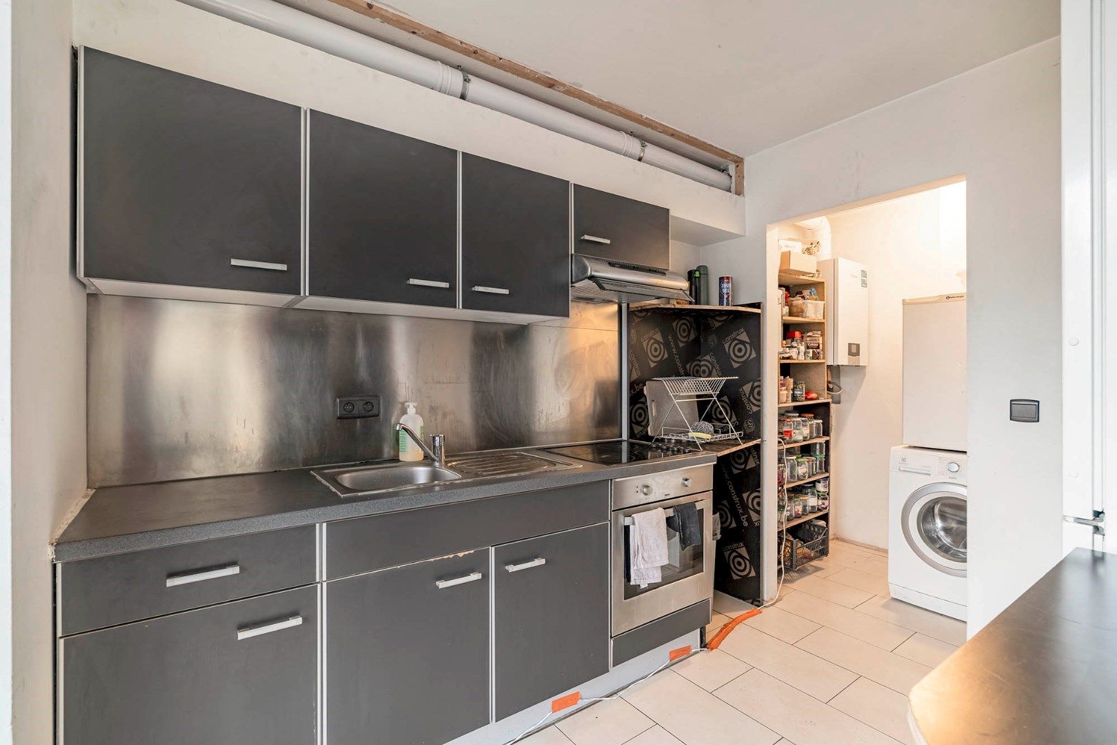 Opbrengsteigendom bestaande uit twee appartementen en één handelsruimte foto 12