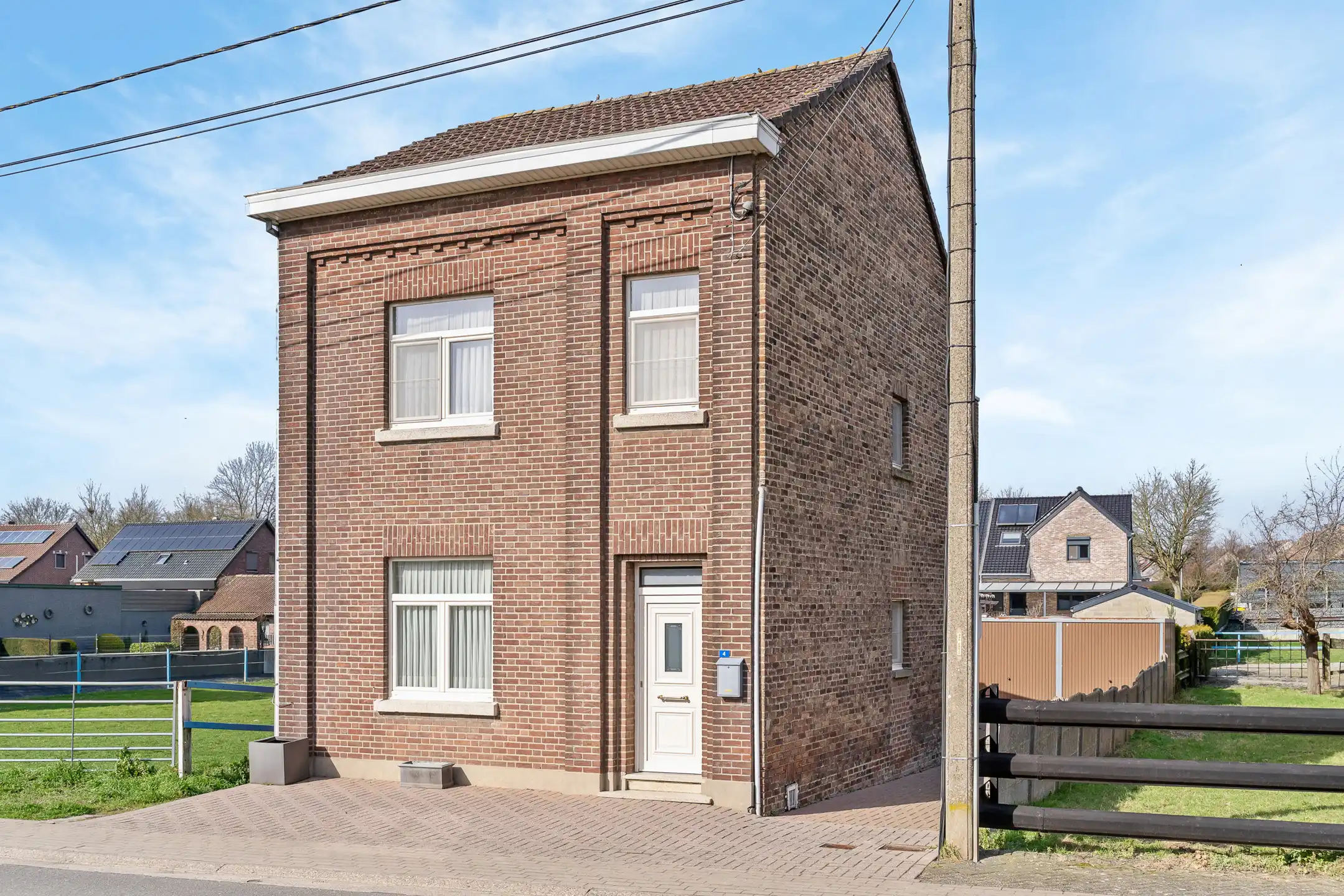 Hoofdfoto van de publicatie: Charmante woning in het hart van Riemst. 