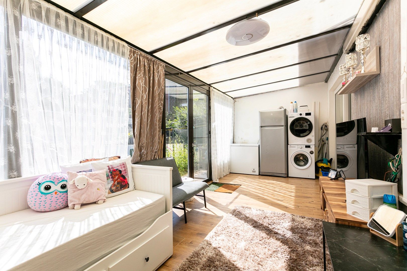 Gerenoveerd gelijkvloers appartement met grote tuin! foto 11