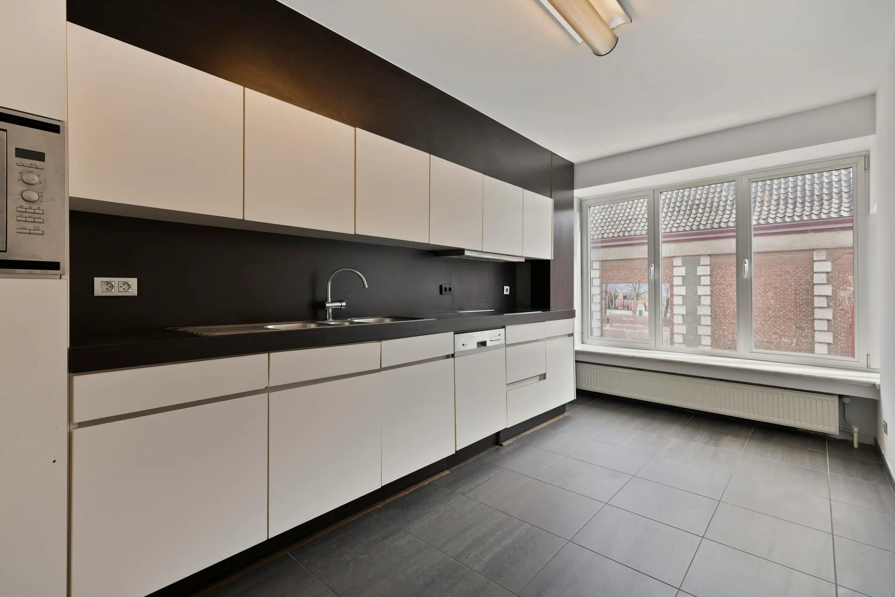 Ruim appartement met groot terras tegenover het Begijnhof foto 3